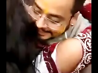 Cute Indian one of a pair kissing publicly